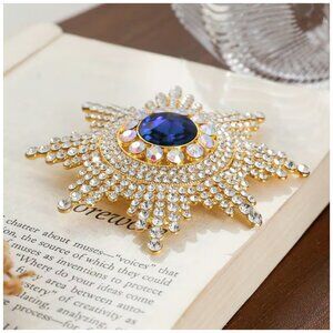 Starburst Brooch Sapphire Blue Center Encompassed by Rhinestones Vintage Court